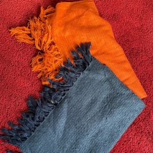 Two West Elm throw blankets. Orange and Blue